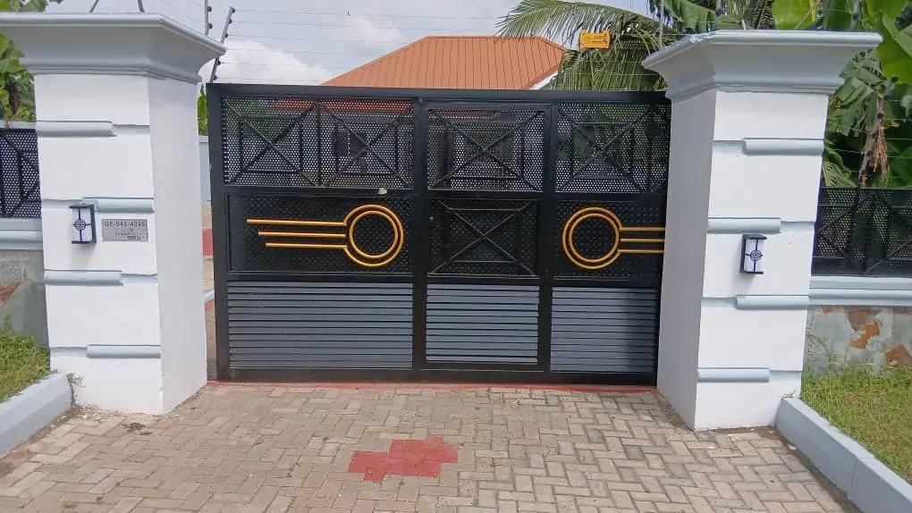 Finished black and gold compound gate