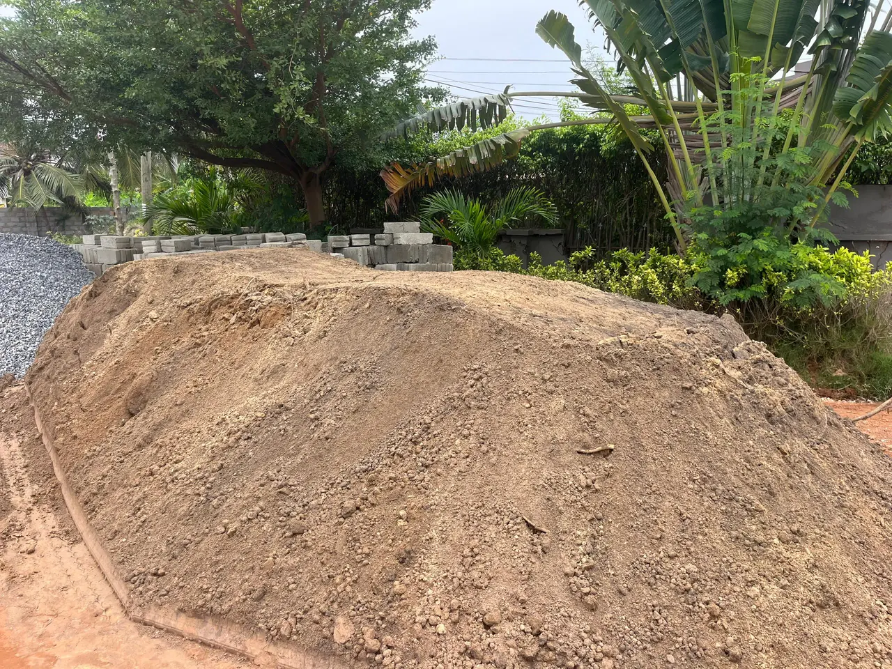 Worker setting out a building foundation